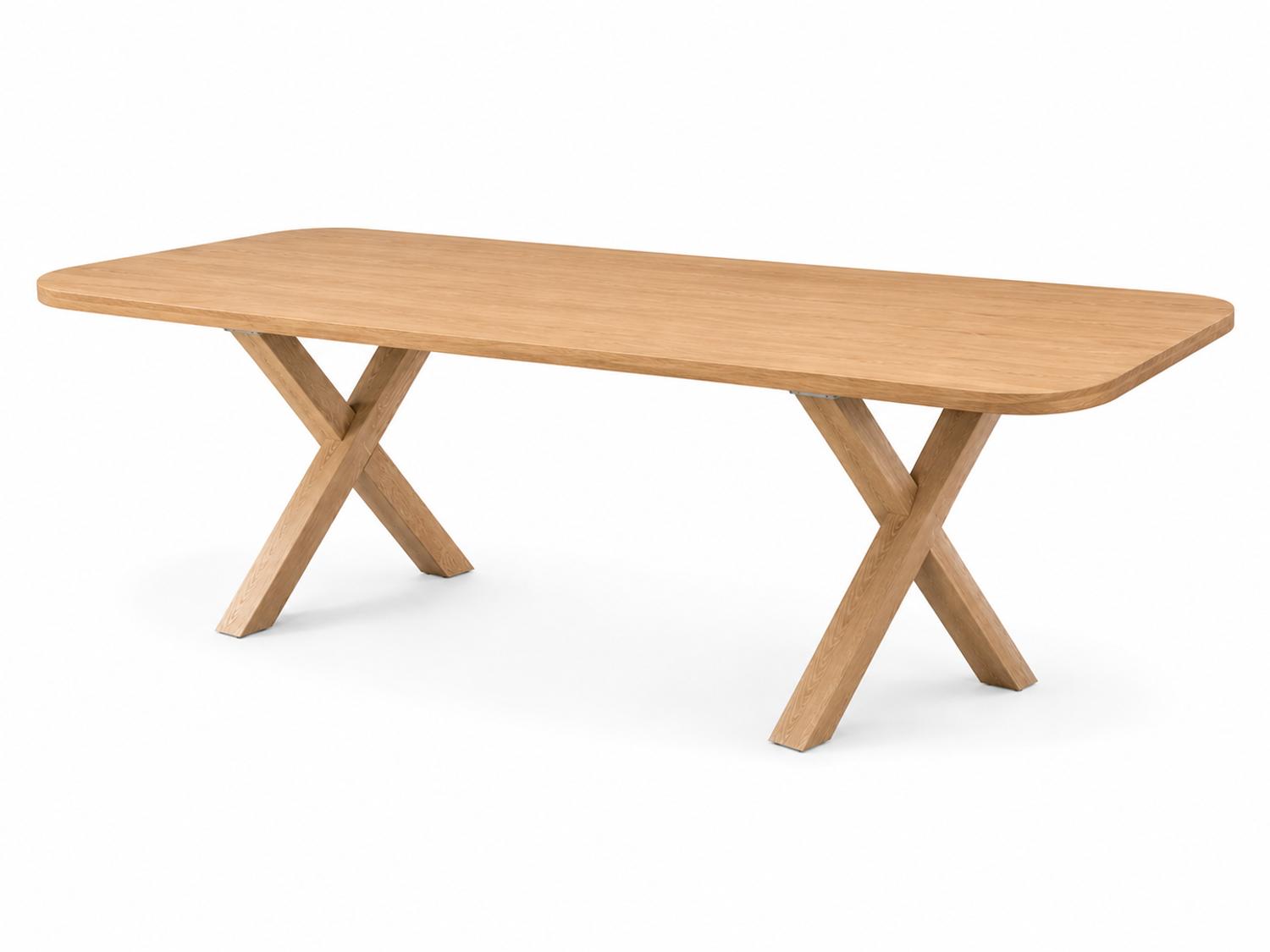 Massief eiken tafel met afgerond rechthoekig tafelblad en twee gekruiste houten onderstellen